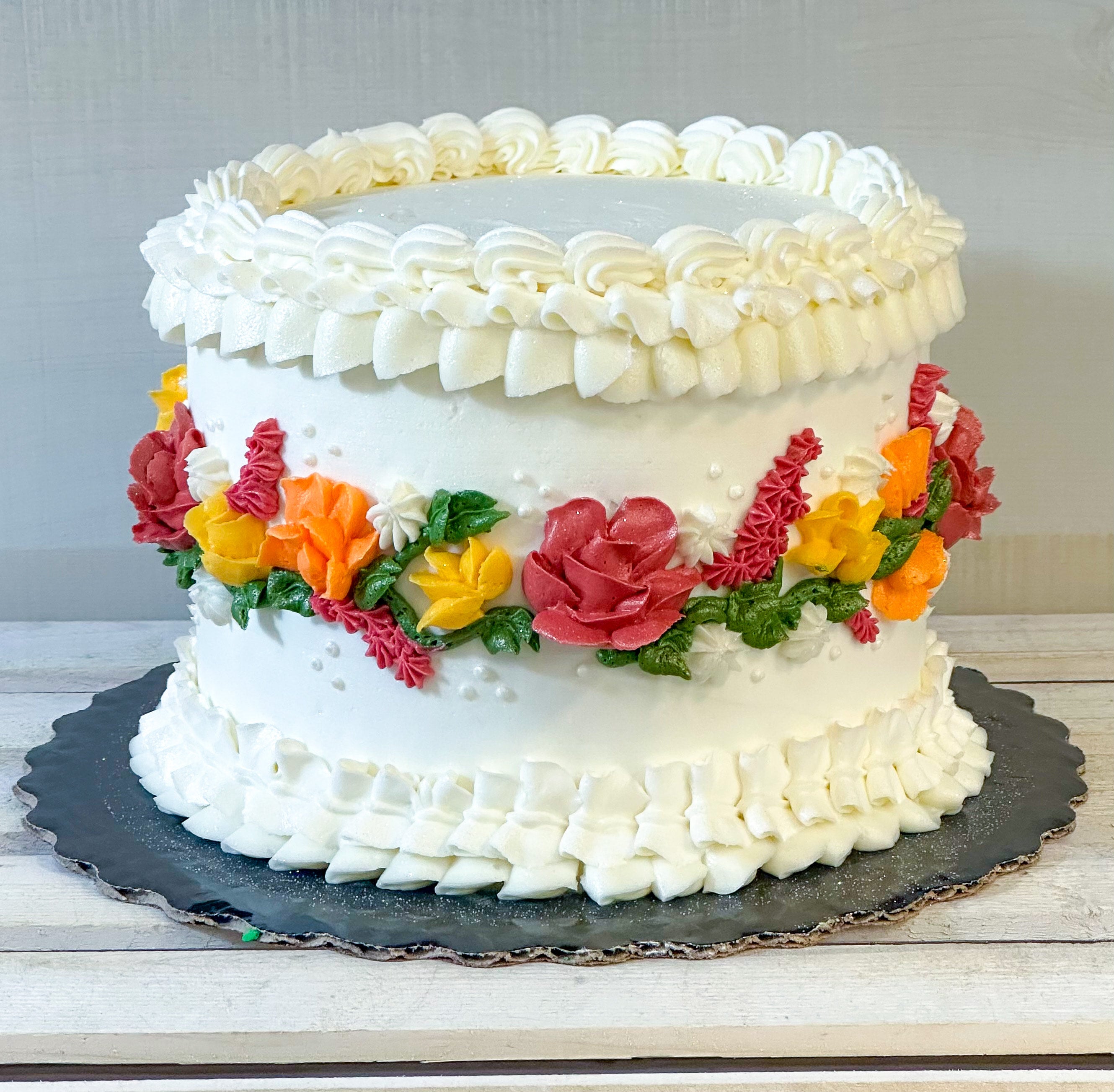 Vertical photo of floral cake design on a white background Stock Photo by  wirestock